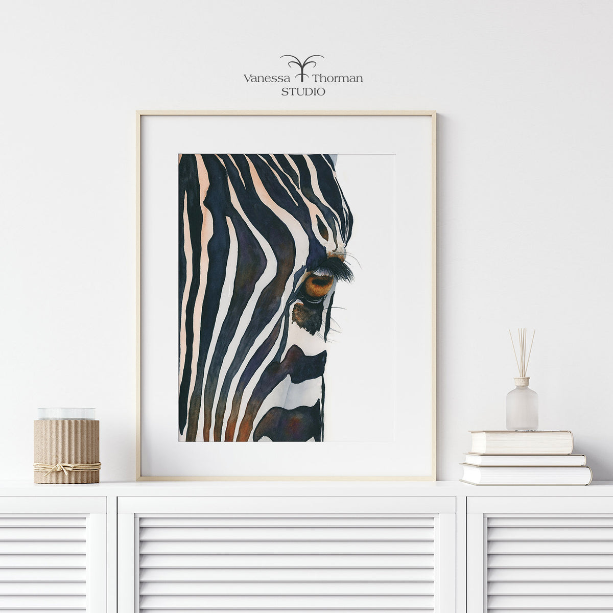 "Eye of the Beholder" zebra eye watercolor art print with white frame