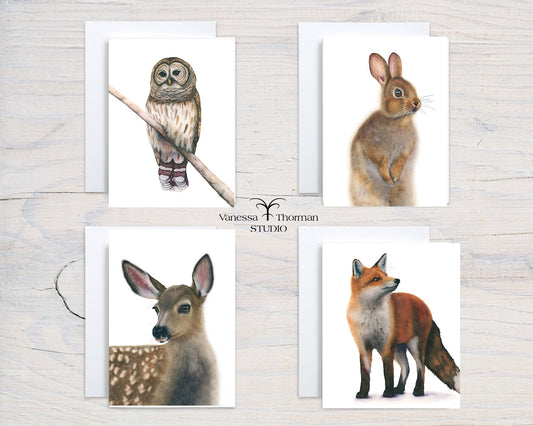 Four Woodland Animal watercolor notecard designs: fox, owl, rabbit, and fawn