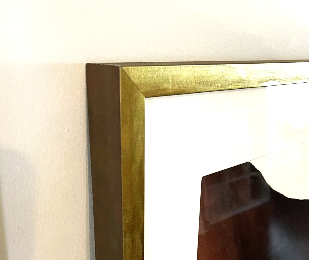 Close-up of a gold-framed painting