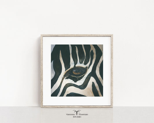 Framed "Eye of the Storm" zebra eye watercolor art print by Vanessa Thorman