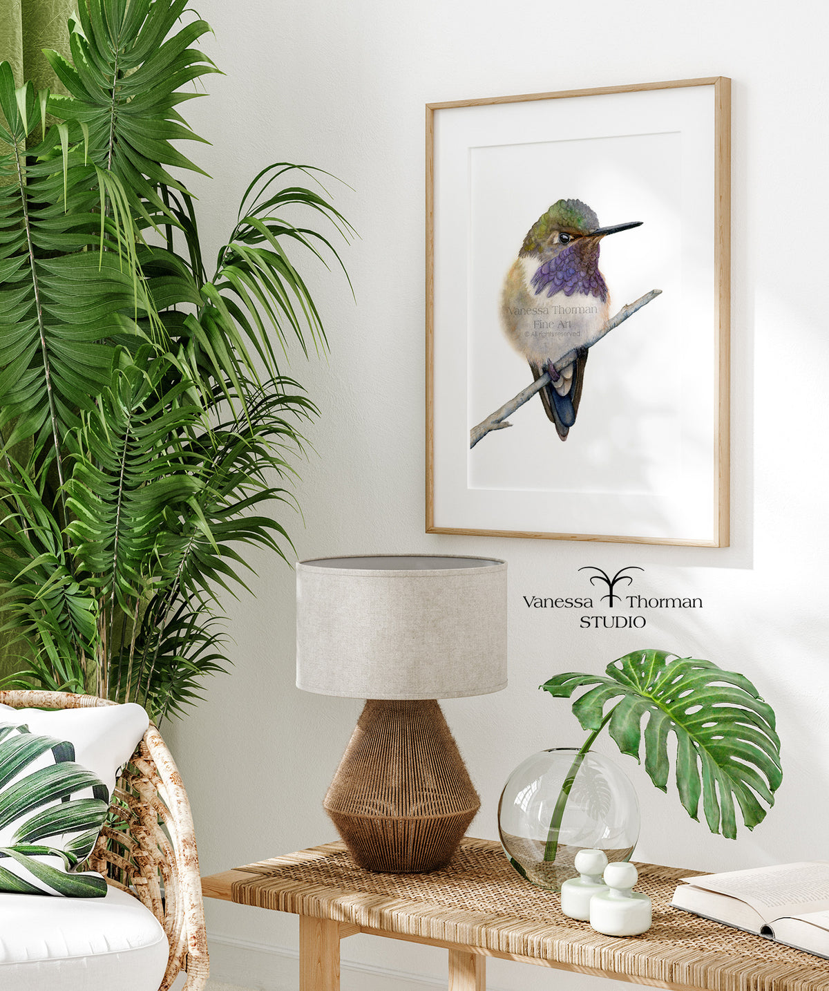 Framed Volcano Hummingbird watercolor art print by Vanessa Thorman hanging on a wall