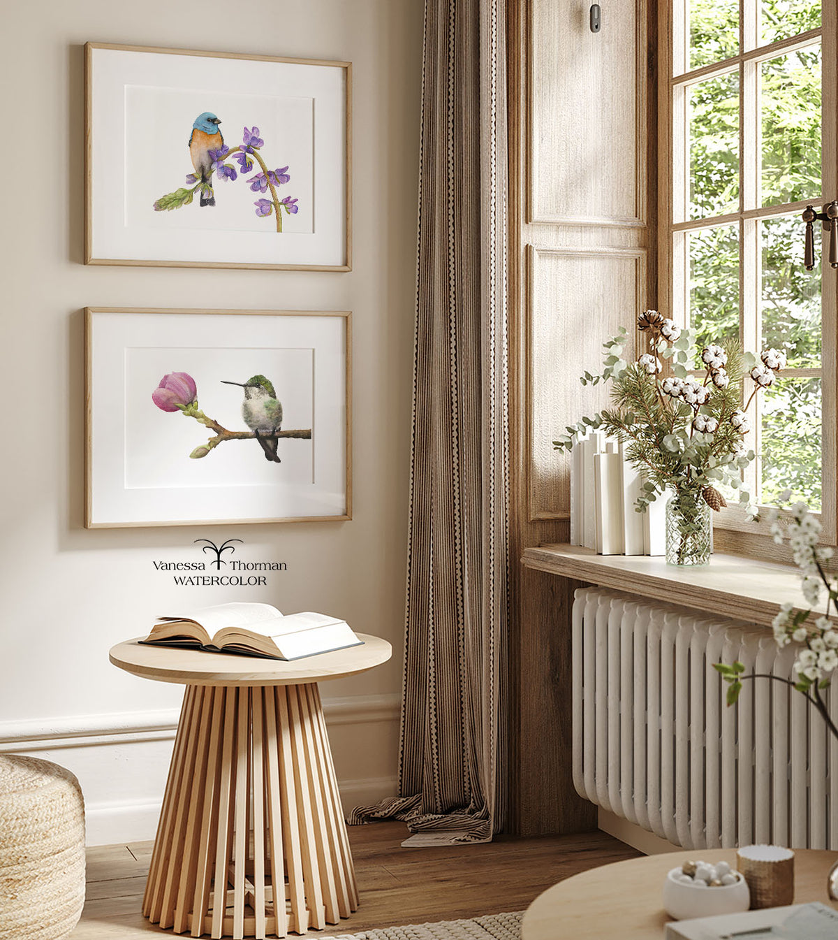 Two framed watercolor art prints displayed together on a wall, including "Hummingbird in Bloom"