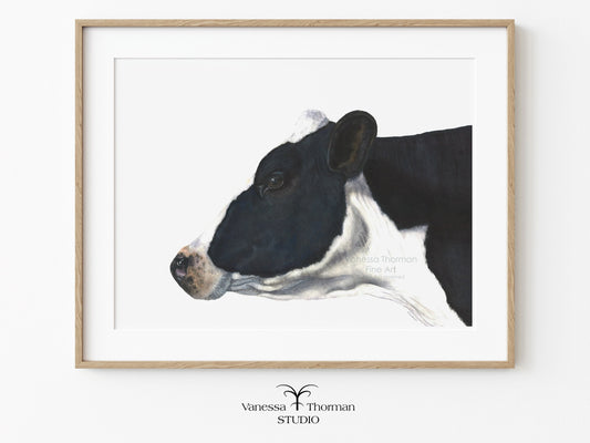 Framed "Belle of the Ball" Holstein Cow watercolor art print on a white background by Vanessa Thorman