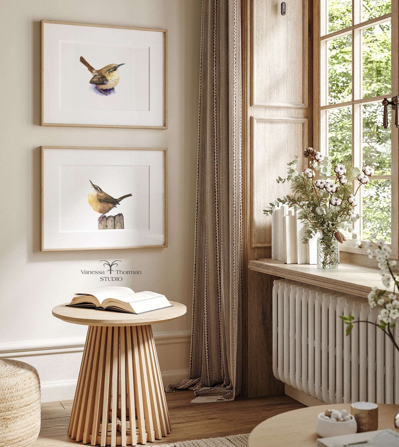 Two framed Carolina Wren watercolor art prints displayed together on a wall