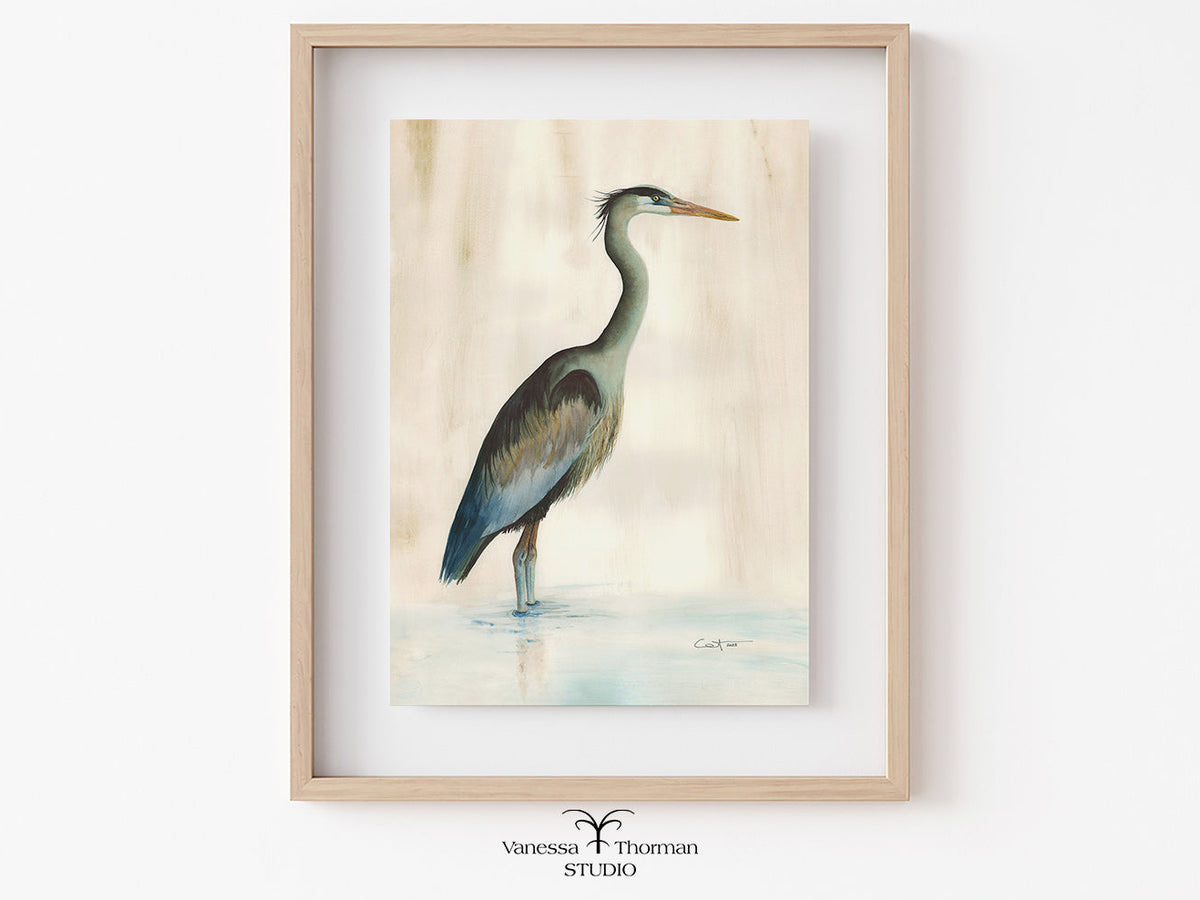 Framed "Marsh Heron in Green" watercolor art print on a light background by Vanessa Thorman