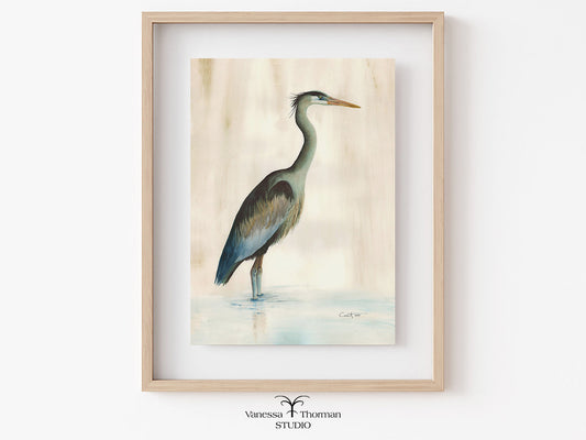 Framed "Marsh Heron in Green" watercolor art print on a light background by Vanessa Thorman