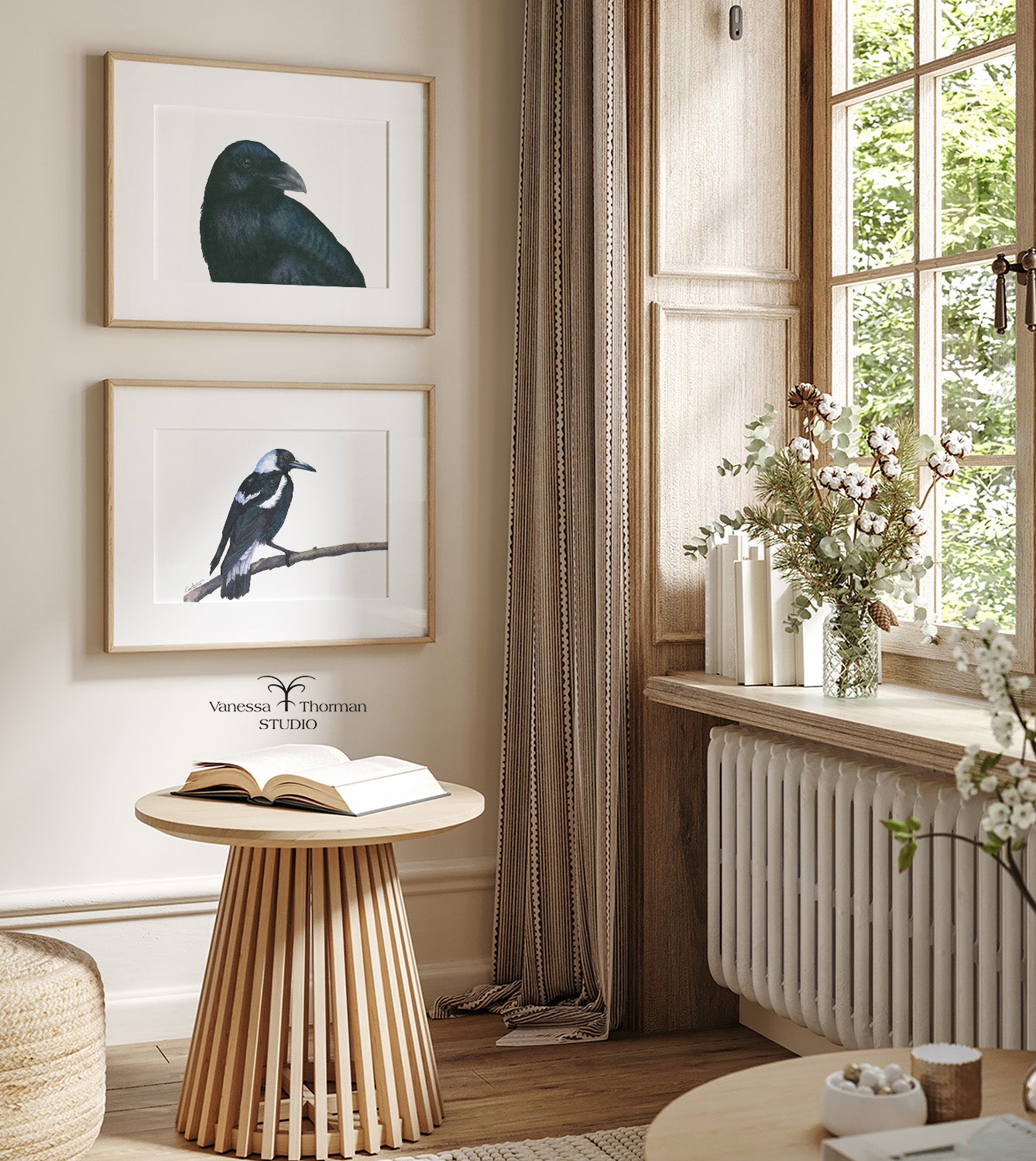 Two framed watercolor art prints displayed together on a wall, including Raven